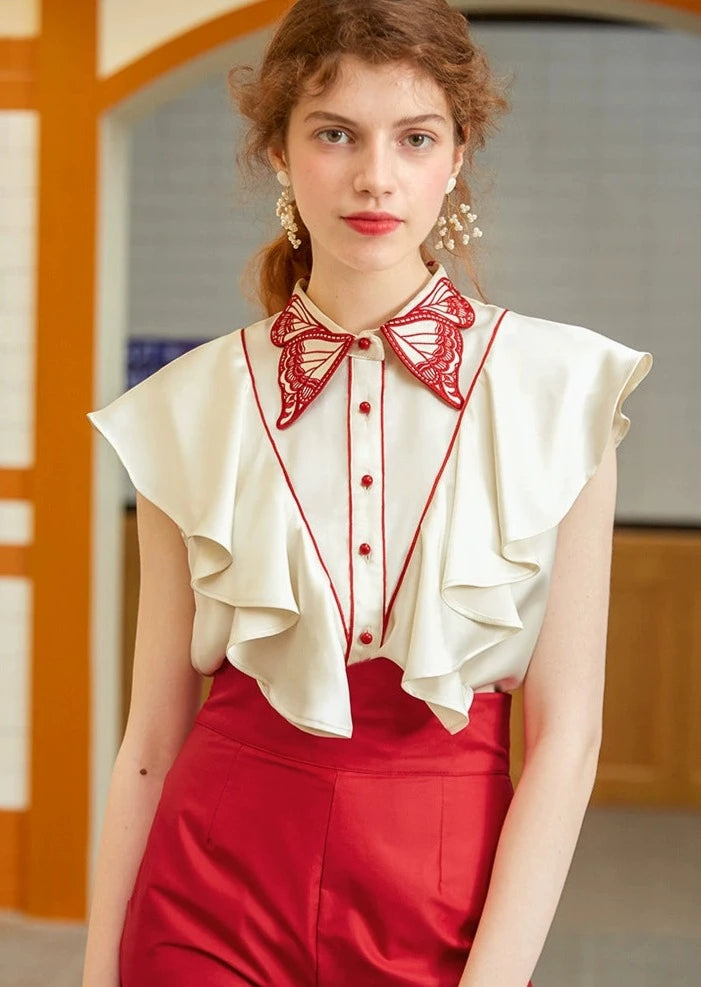 Butterfly embroidered collar sleeveless blouse B2918